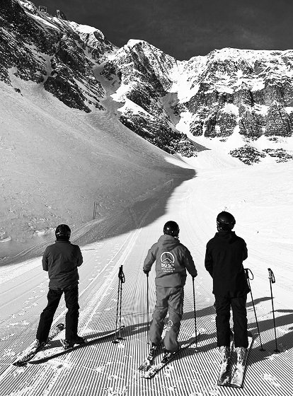 three people skiing